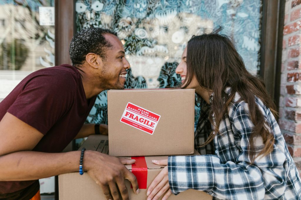 A couple enjoying peace of mind using packing & storage services from All The Right Moves Ltd.